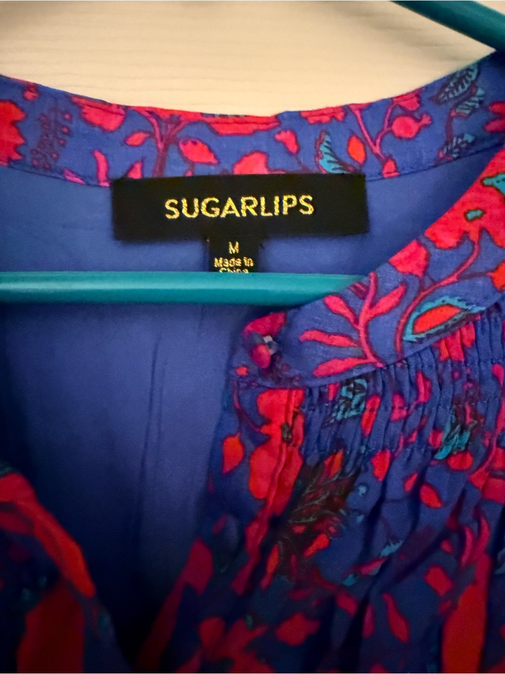 Sugarlips Floral Peasant Blouse in blue with red Accents